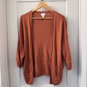 Orange Oldnavy cardigan.